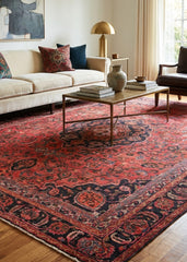Oriental hand-knotted Persian wool rug in a classic traditional living room