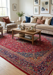 Oriental hand-knotted Persian wool rug in a classic traditional living room