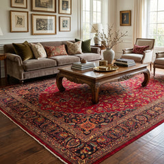 Oriental hand-knotted Persian wool rug in a classic traditional living room