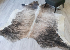 Brown and beige cowskin rug