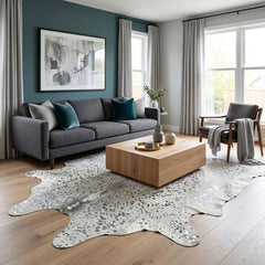Genuine silver speckled cowhide rug in natural hide shape