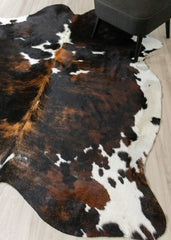 extra large real cow hide rug on floor